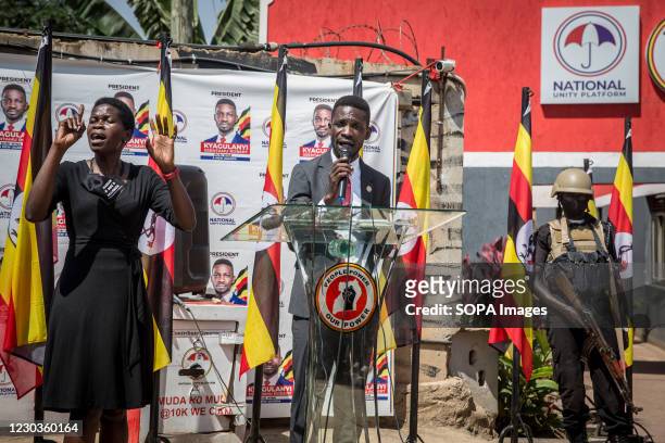 Ugandan opposition Presidential Candidate, Robert Kyagulanyi Ssentamu commonly known as Bobi Wine, speaks during a press conference at the...