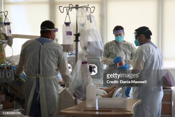 Hospital doctors and nurses treat Covid-19 patients in a makeshift ICU wing on the West Oeste at Harbor UCLA Medical Center on Tuesday, Dec. 29, 2020...