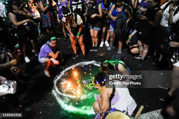 Abortion-rights activists rally outside Congress as lawmakers debate a bill that would legalize abortion, in Buenos Aires, Argentina, Tuesday, Dec....