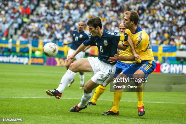 Javier Zanetti of Argentina and Teddy Lucic of Sweden during the FIFA World Cup match between Sweden and Argentina, at Miyagi Stadium, Miyagi, Japan,...