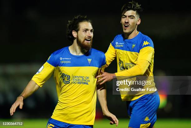 Hugo Gomes of GD Estoril Praia celebrates with teammate Andre Franco of GD Estoril Praia after scoring a goal during the Liga 2 Sabseg match between...