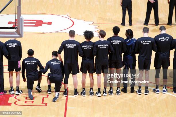 Penn State Nittany Lions wear Black Lives Matter on their warmups while some Penn State players kneel during the National Anthem before the game...