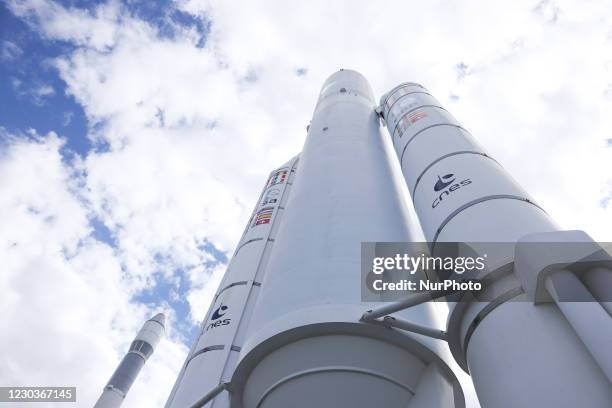 Ariane V space rocket with boosters standing. Full-scale model demonstration of Ariane 5 launcher space technology, ESA EADS Ariane space rocket in...