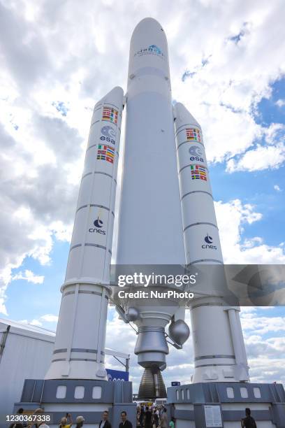 Ariane V space rocket with boosters standing. Full-scale model demonstration of Ariane 5 launcher space technology, ESA EADS Ariane space rocket in...