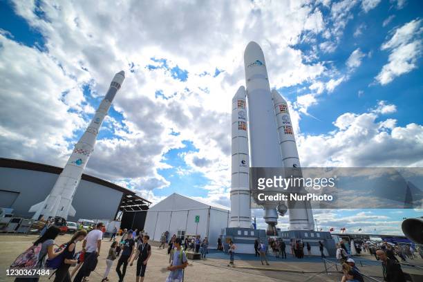 Ariane V space rocket with boosters standing. Full-scale model demonstration of Ariane 5 launcher space technology, ESA EADS Ariane space rocket in...