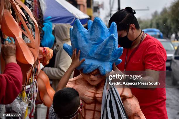 The sale of figures and subsequent burning of them is a tradition to say goodbye to 2020 on December 31, 2020 in Quito, Ecuador.