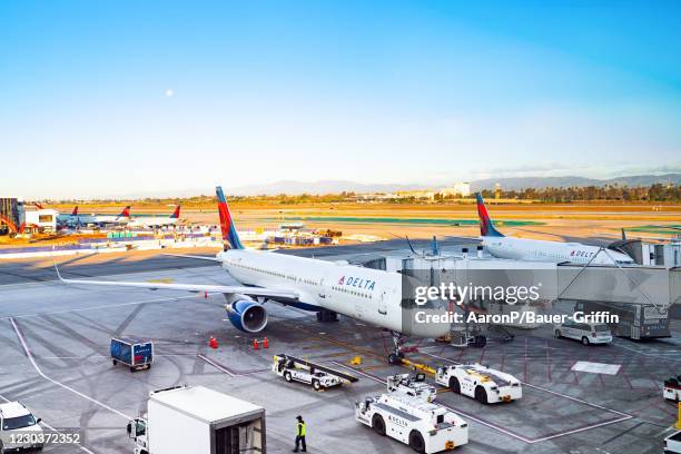 Delta Airlines Boeing 757-200 prepares for boarding at Los Angeles International Airport on December 31, 2020 in Los Angeles, California.