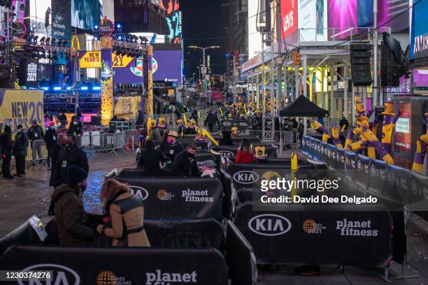 Revelers celebrate New Years Eve in socially distanced pods at Times Square on December 31 in New York City. On average, about one million revelers...