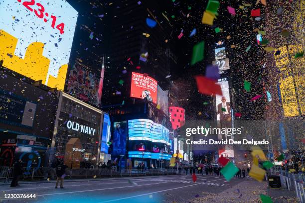 The New Year's Eve ball drops in a mostly empty Times Square on January 1 in New York City. On average, about one million revelers are drawn to the...