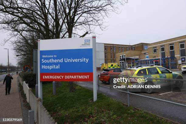 Signage is seen outside Southend University Hospital in Essex, eastern England, on January 1, 2021. - Britain said December 31 that it had vaccinated...