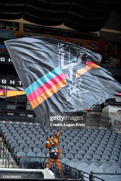 San Antonio Spurs mascot The Coyote waves a flag during the game against the Los Angeles Lakers on January 1, 2021 at the AT&T Center in San Antonio,...