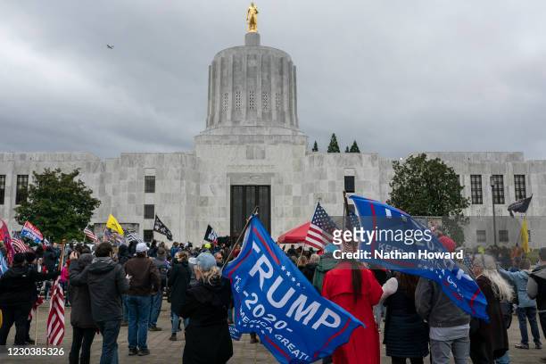 Members of the far-right gather to protest COVID-19 restrictions at the state capitol on January 1, 2021 in Salem, Oregon. Police declared the event...