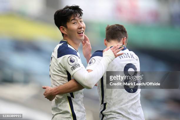 Heung-Min Son of Spurs celebrates scoring their 2nd goal with Harry Winks during the Premier League match between Tottenham Hotspur and Leeds United...