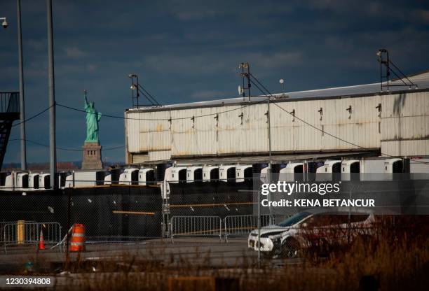 Provisional morgue made up of refrigerated trailers is set up at the South Brooklyn Marine Terminal in New York on January 2, 2021. - The United...