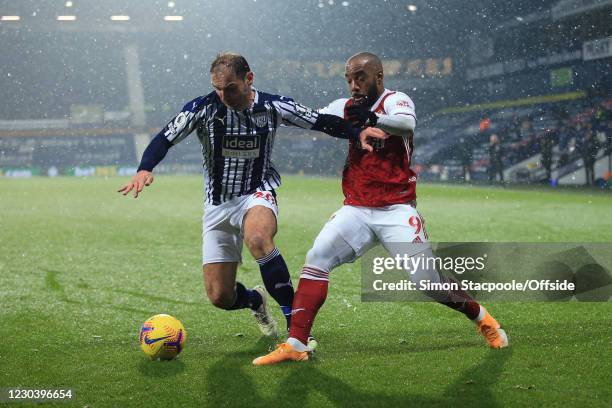 Branislav Ivanovic of West Bromwich Albion and Alexandre Lacazette of Arsenal during the Premier League match between West Bromwich Albion and...