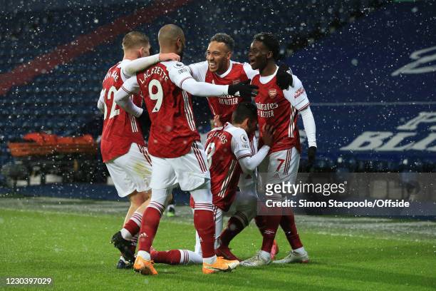 Bukayo Saka of Arsenal celebrates scoring their 2nd goal with Emile Smith Rowe, Alexandre Lacazette, Pierre-Emerick Aubameyang and Dani Ceballos...