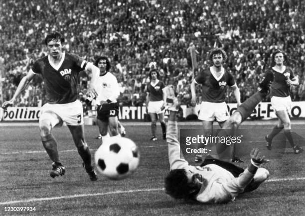 Goalkeeper of East Germany Jurgen Croy stops a goal of West Germany team during the World Cup first round football match between East Germany and...