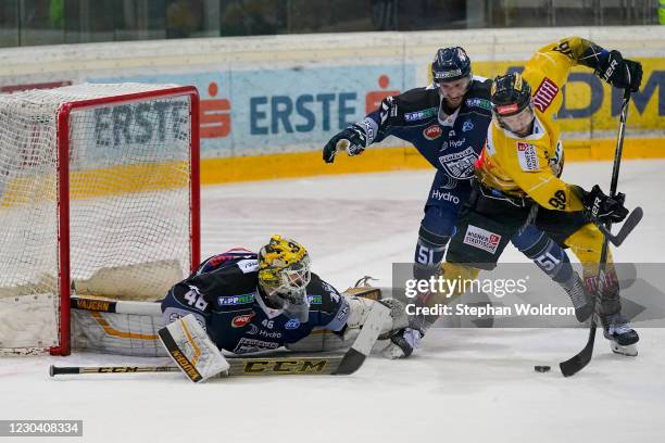 Jaroslav Janus of Fehervar, Timothy Campbell of Fehervar and Nikolaus Hartl of Vienna during the Bet-at-home Ice Hockey League Vienna Capitals v...