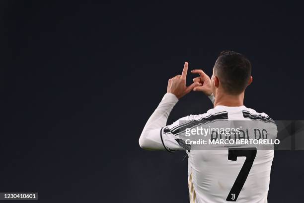 Juventus' Portuguese forward Cristiano Ronaldo celebrates after opening the scoring during the Italian Serie A football match Juventus vs Udinese on...