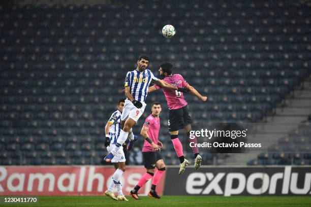 Mehdi Taremi of FC Porto competes for the ball with Fabio Pacheco of Moreirense during the Liga NOS match between FC Porto and Moreirense FC at...