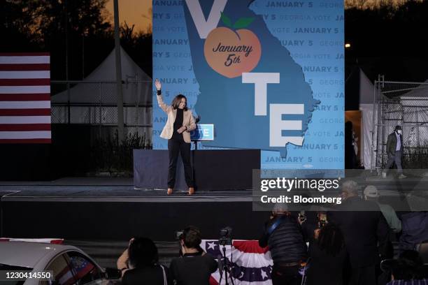 Vice President-elect Kamala Harris, waves after speaking during a 'Get Out The Vote' campaign event with U.S. Democratic Senate candidates Raphael...