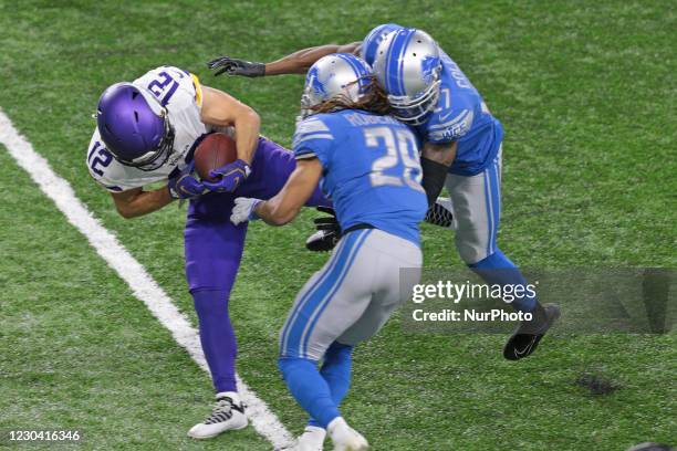 Minnesota Vikings wide receiver Chad Beebe breaks free from Detroit Lions running back Adrian Peterson and cornerback Justin Coleman during the first...