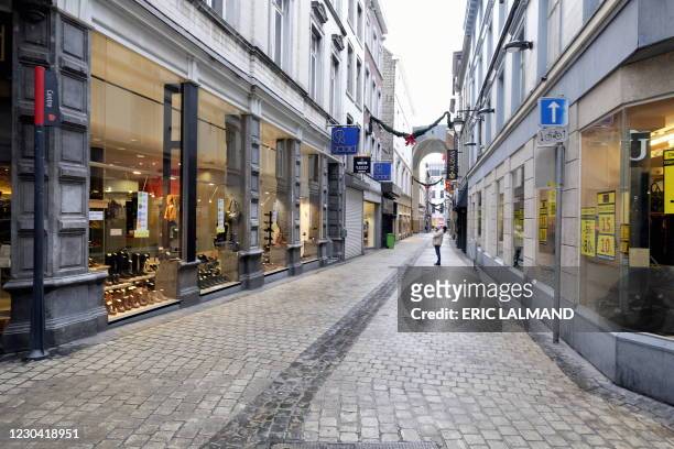 Illutration shows an almost empty commercial street at the official start of the winter sales, Monday 04 January 2021 in Liege. BELGA PHOTO ERIC...