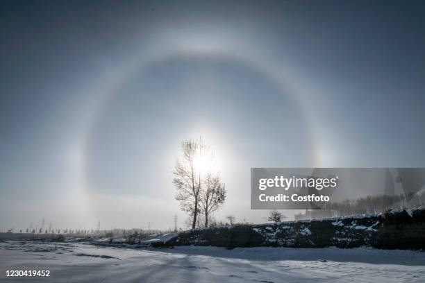 Sundog is seen in hulunbuir, Inner Mongolia, On January 3, 2021.-