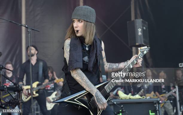Picture taken on August 2015 shows Finnish singer and guitarist Alexi Laiho of the Finnish black metal band "Children of Bodom", perform during the...