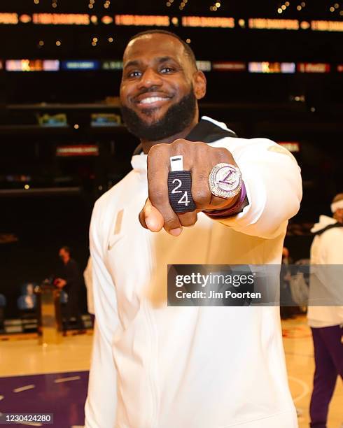 LeBron James of the Los Angeles Lakers shows his Championship rings after the game against the LA Clippers on December 22, 2020 at STAPLES Center in...