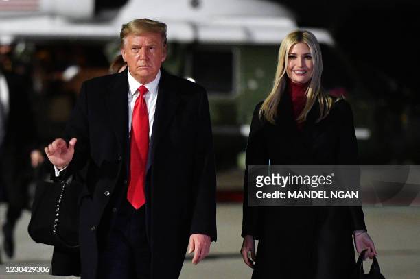 President Donald Trump and daughter Senior Advisor Ivanka Trump make their way to board Air Force One before departing from Dobbins Air Reserve Base...