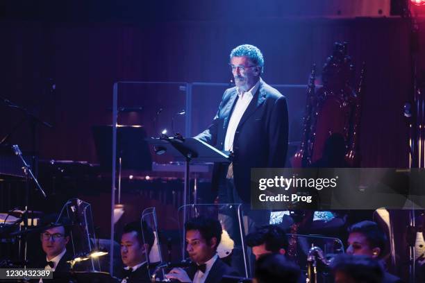 English actor Robert Powell performing live on stage with Rick Wakeman at Royal Festival Hall in London, on July 14, 2019.