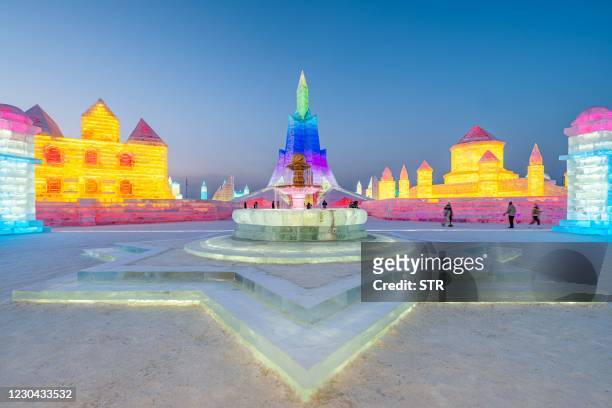 Ice sculptures are seen at the Harbin Ice and Snow Festival in Harbin, in northeastern China's Heilongjiang province on January 5, 2021. / China OUT