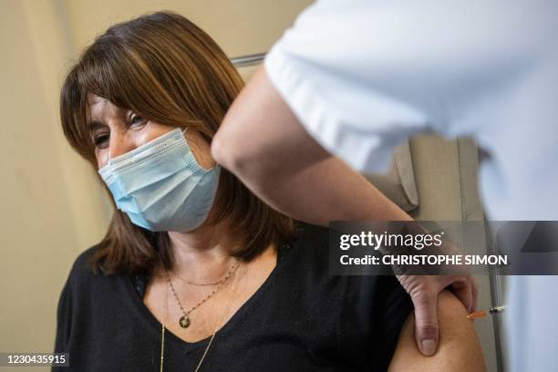 Former mayor of Marseille Michelle Rubirola receives the Pfizer-BioNTech Covid-19 vaccine at the Timone Hospital in Marseille, southeastern France,...