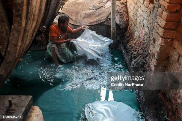 Labourers are working at a tannery factory at Hazaribagh Dhaka, Bangladesh on January 05, 2021.. The Leather industry is a major industry in...