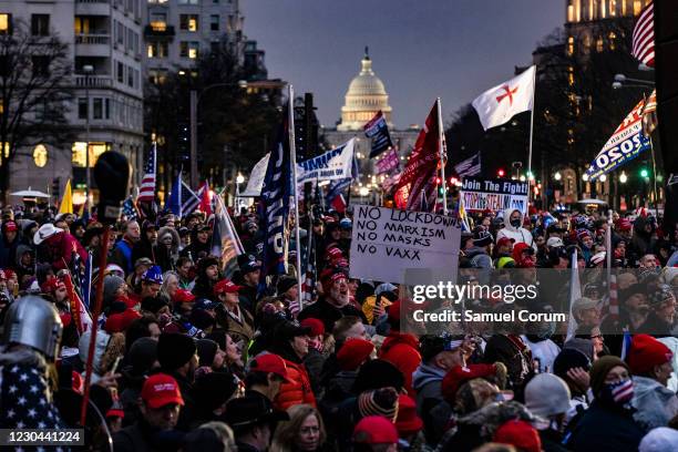Supporters of President Donald Trump gather in the rain for a rally at Freedom Plaza on January 5, 2021 in Washington, DC. Today's rally kicks off...