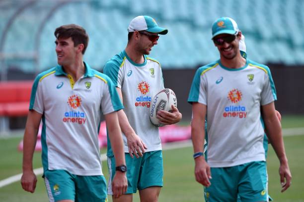 Australia's pacemen Josh Hazlewood , Mitchell Starc and Pat Cummins attend a training session at the Sydney Cricket Ground on January 6 ahead of the...