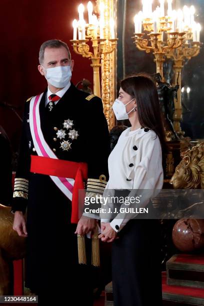 Spain's Felipe VI and Queen Letizia attend the "Pascua Militar" traditional ceremony at the Royal Palace in Madrid on January 6, 2021.