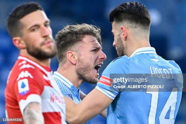 Lazio's Italian forward Ciro Immobile celebrates with Lazio's Dutch defender Wesley Hoedt after scoring during the Italian Serie A football match...