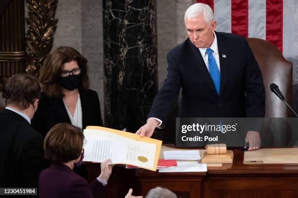 Vice President Mike Pence presides over a joint session of Congress on January 06, 2021 in Washington, DC. Congress held a joint session today to...