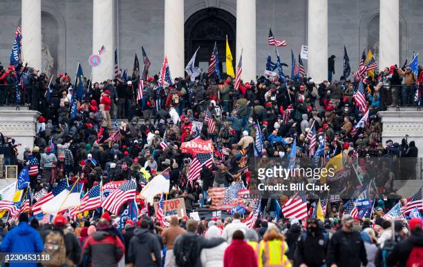 Trump supporters take over the steps of the Capitol on Wednesday, Jan. 6 as the Congress works to certify the electoral college votes.