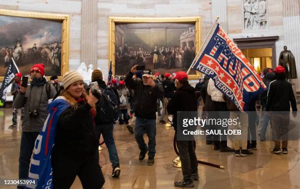 Supporters of US President Donald Trump enter the US Capitol's Rotunda on January 6 in Washington, DC. Demonstrators breeched security and entered...