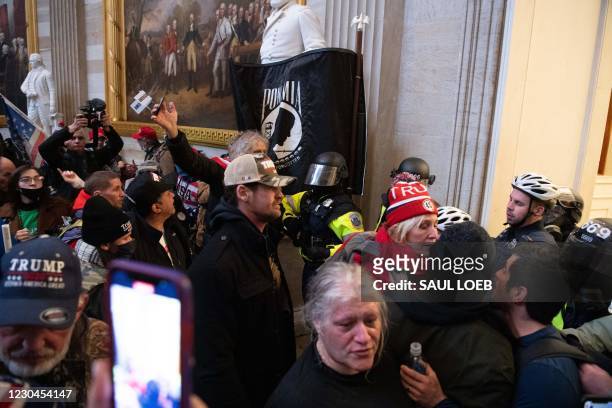 Supporters of US President Donald Trump protest in the US Capitol's Rotunda on January 6 in Washington, DC. - Demonstrators breeched security and...