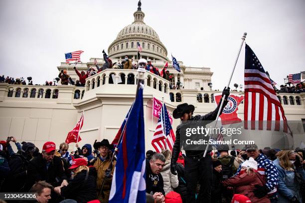 Pro-Trump supporters storm the U.S. Capitol following a rally with President Donald Trump on January 6, 2021 in Washington, DC. Trump supporters...