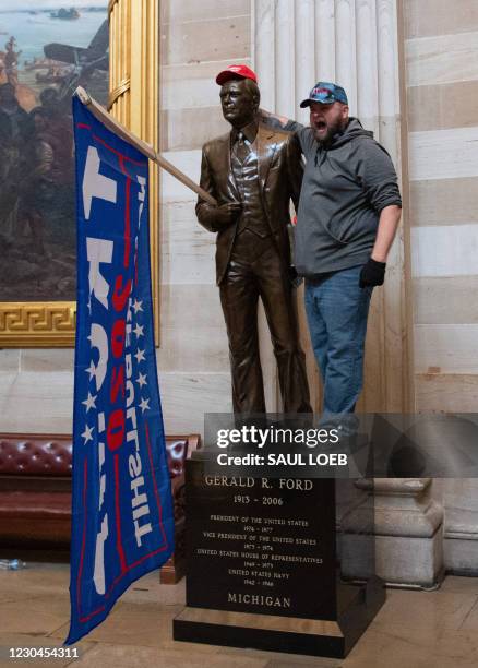 Supporters of US President Donald Trump enter the US Capitol's Rotunda on January 6 in Washington, DC. Demonstrators breeched security and entered...