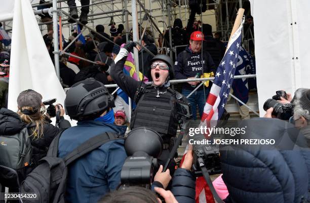 Man calls on people to raid the building as Trump supporters clash with police and security forces as they try to storm the US Capitol in Washington...