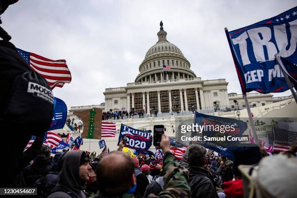 Pro-Trump supporters storm the U.S. Capitol following a rally with President Donald Trump on January 6, 2021 in Washington, DC. Trump supporters...