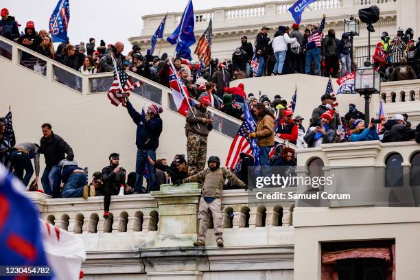 Pro-Trump supporters storm the U.S. Capitol following a rally with President Donald Trump on January 6, 2021 in Washington, DC. Trump supporters...