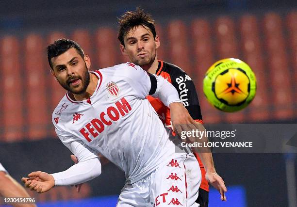 Lorient's French defender Vincent Le Goff fights for the ball with Monaco's German forward Kevin Volland during the French L1 football match between...