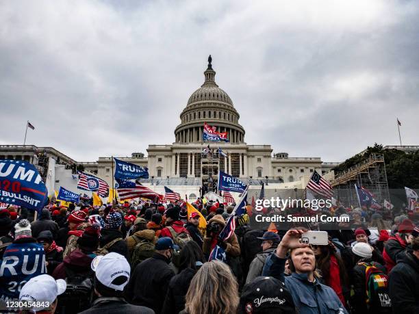 Pro-Trump supporters storm the U.S. Capitol following a rally with President Donald Trump on January 6, 2021 in Washington, DC. Trump supporters...